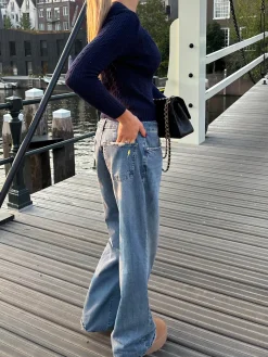 Alaia lavtaljede jeans med lyndetalje - Lys denim