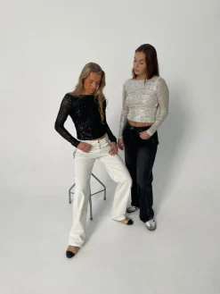 Babette pallietbluse med åben ryg - Sølv