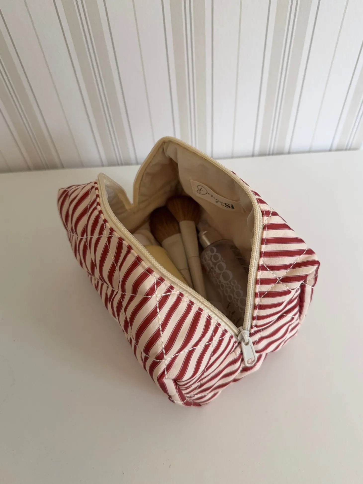 Honey lille toilettaske - Striber i rød/beige